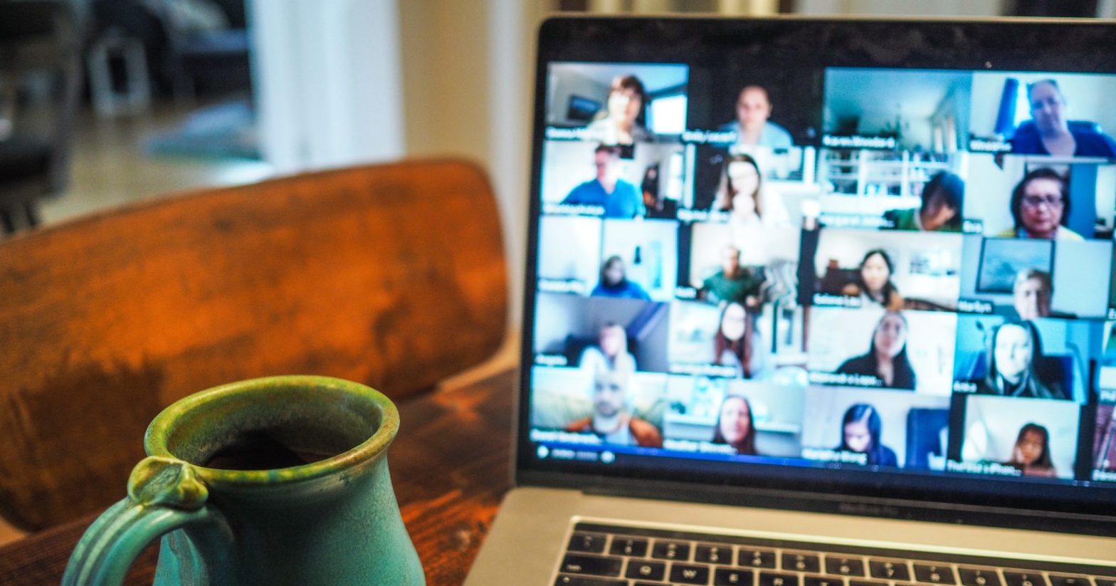 macbook pro displaying group of people